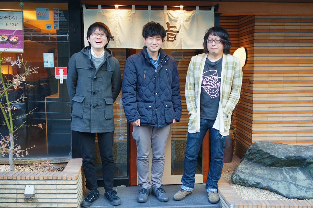 お寿司屋さんの前で