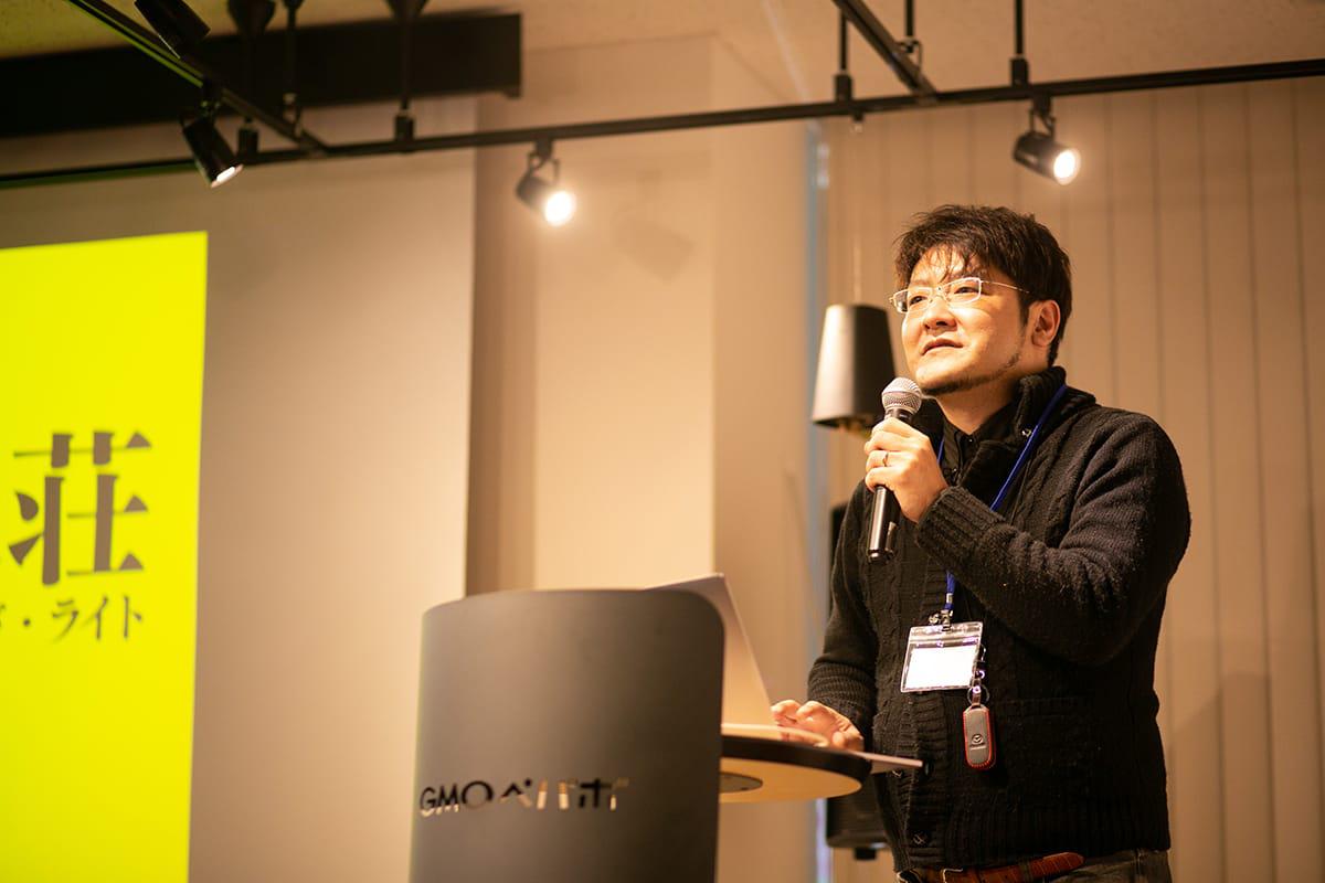 壇上でプレゼンする@yamato_nagata